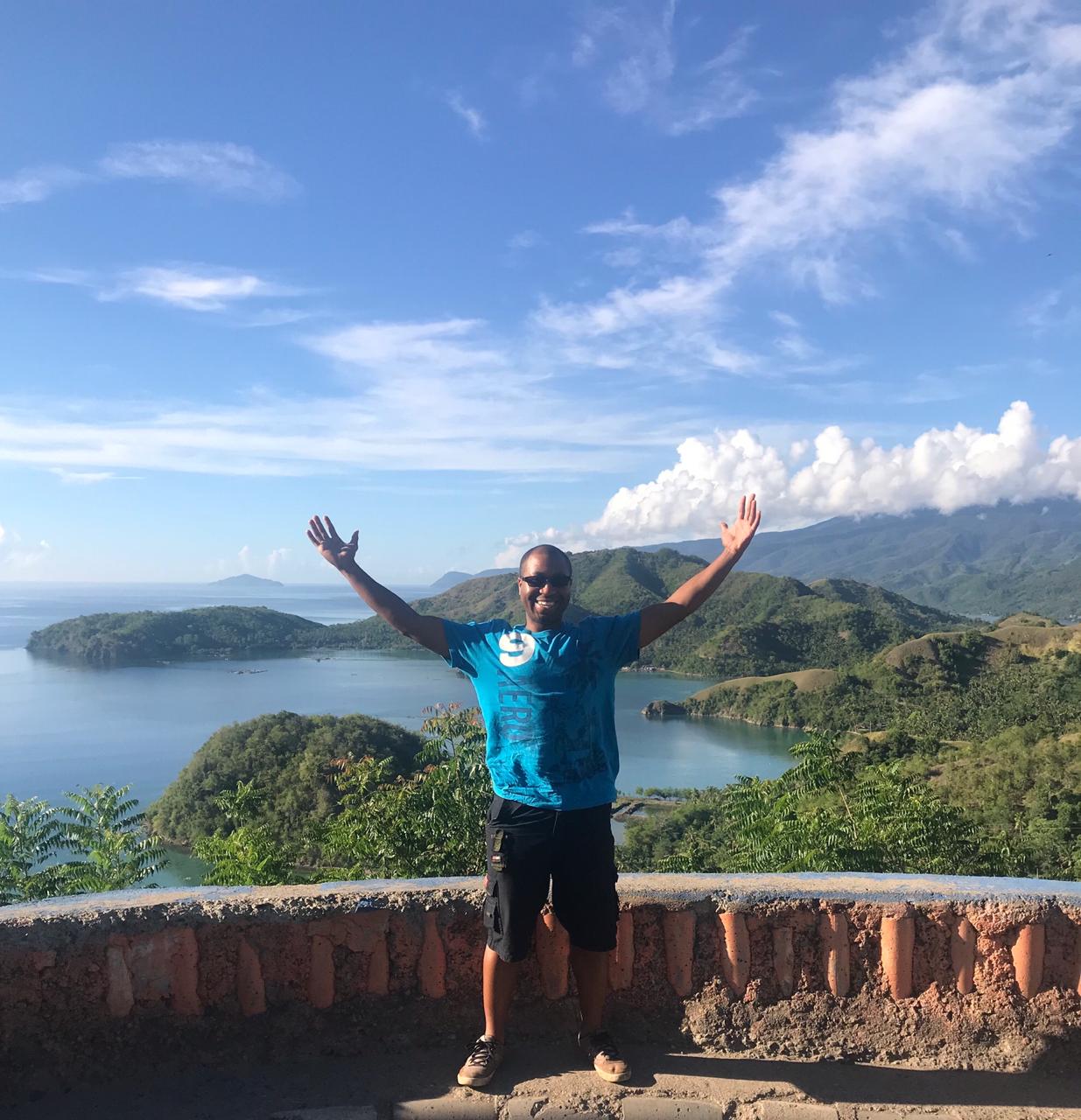 Top 5 Things To Know Before Visiting the Philippines. Me with backdrop of Dinosaur Island.