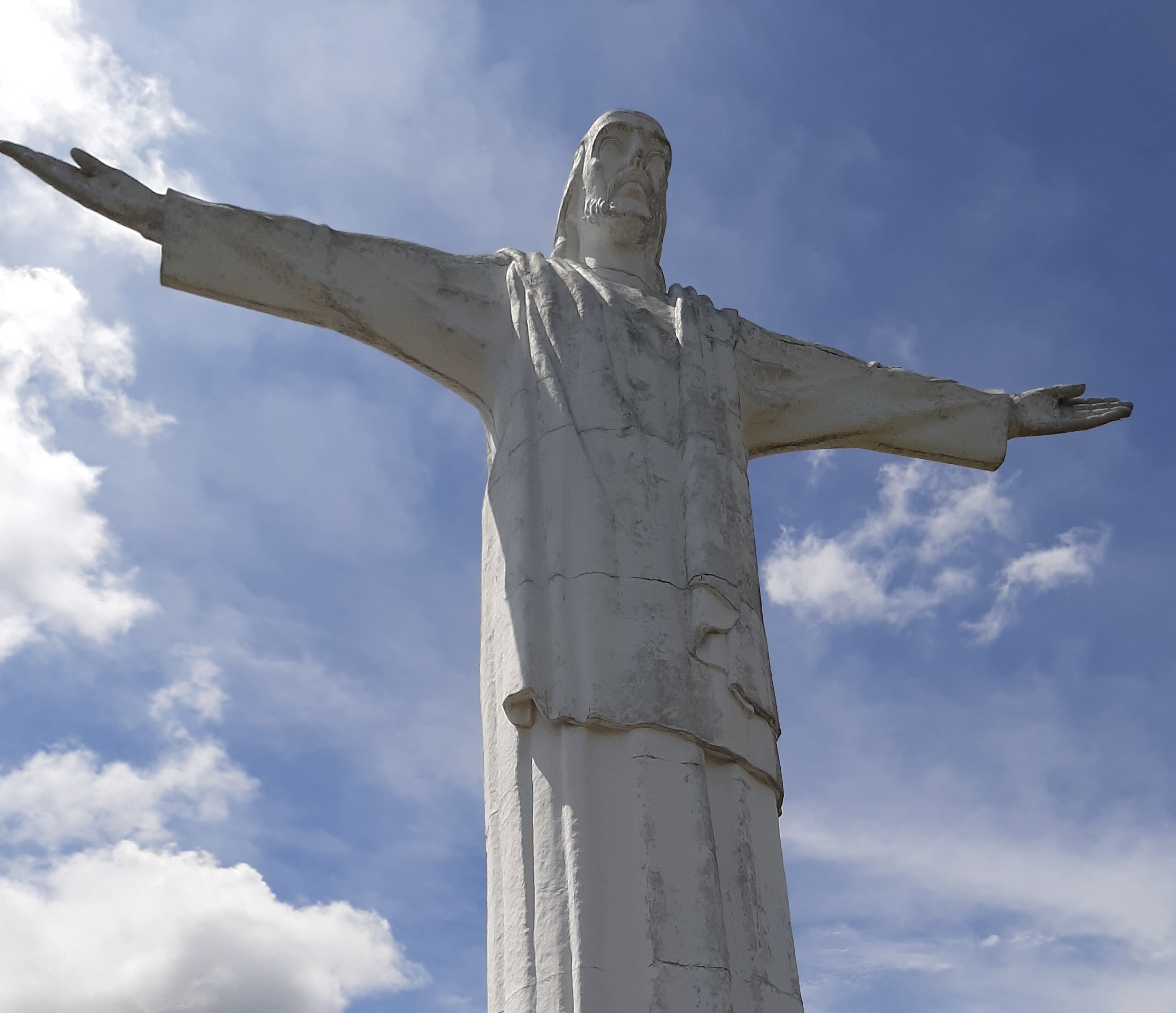 Budget Travel Blog. Solo budget travel. Cristo Rey statue