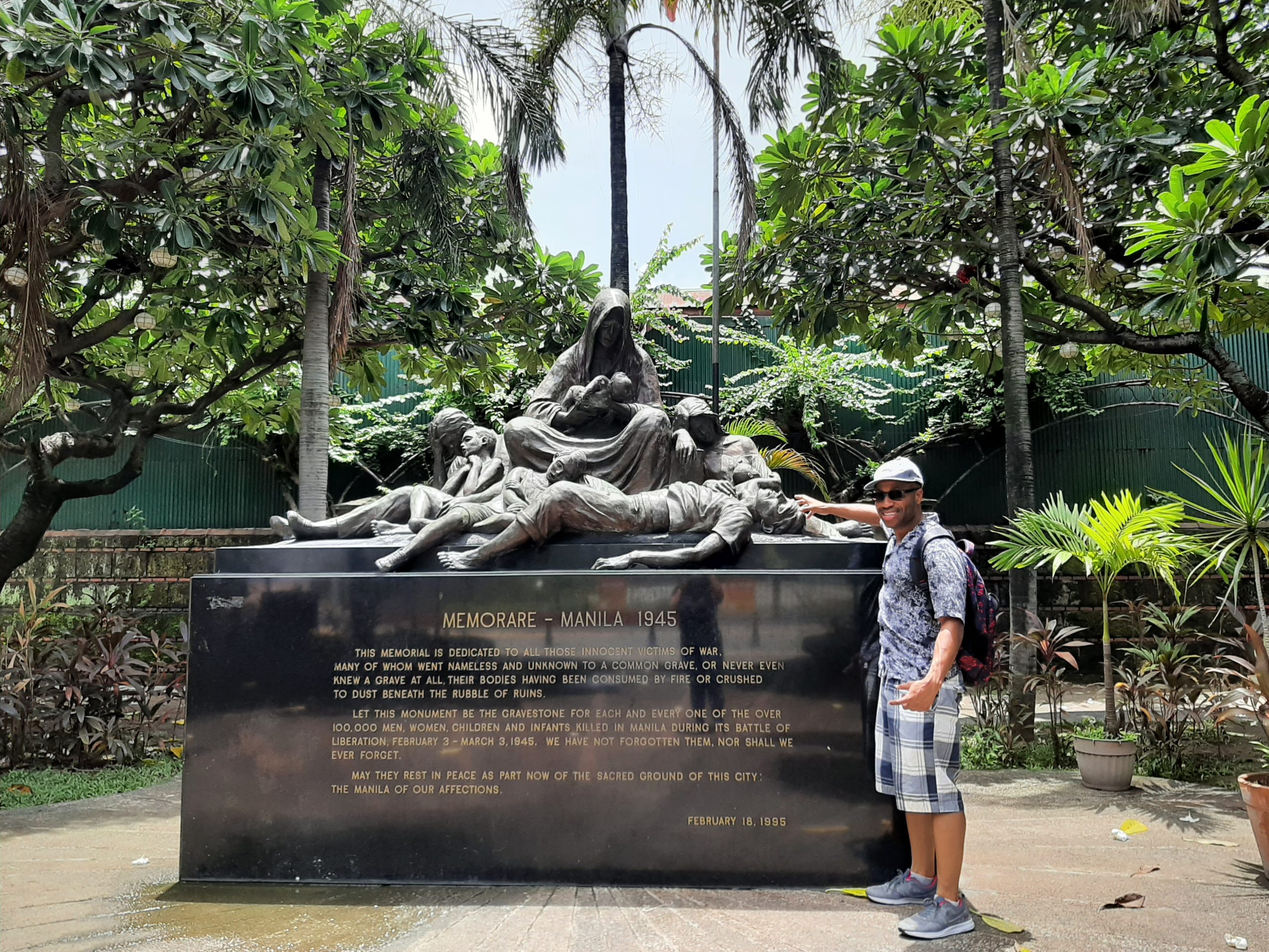 In front of a Memorial statue in Manila