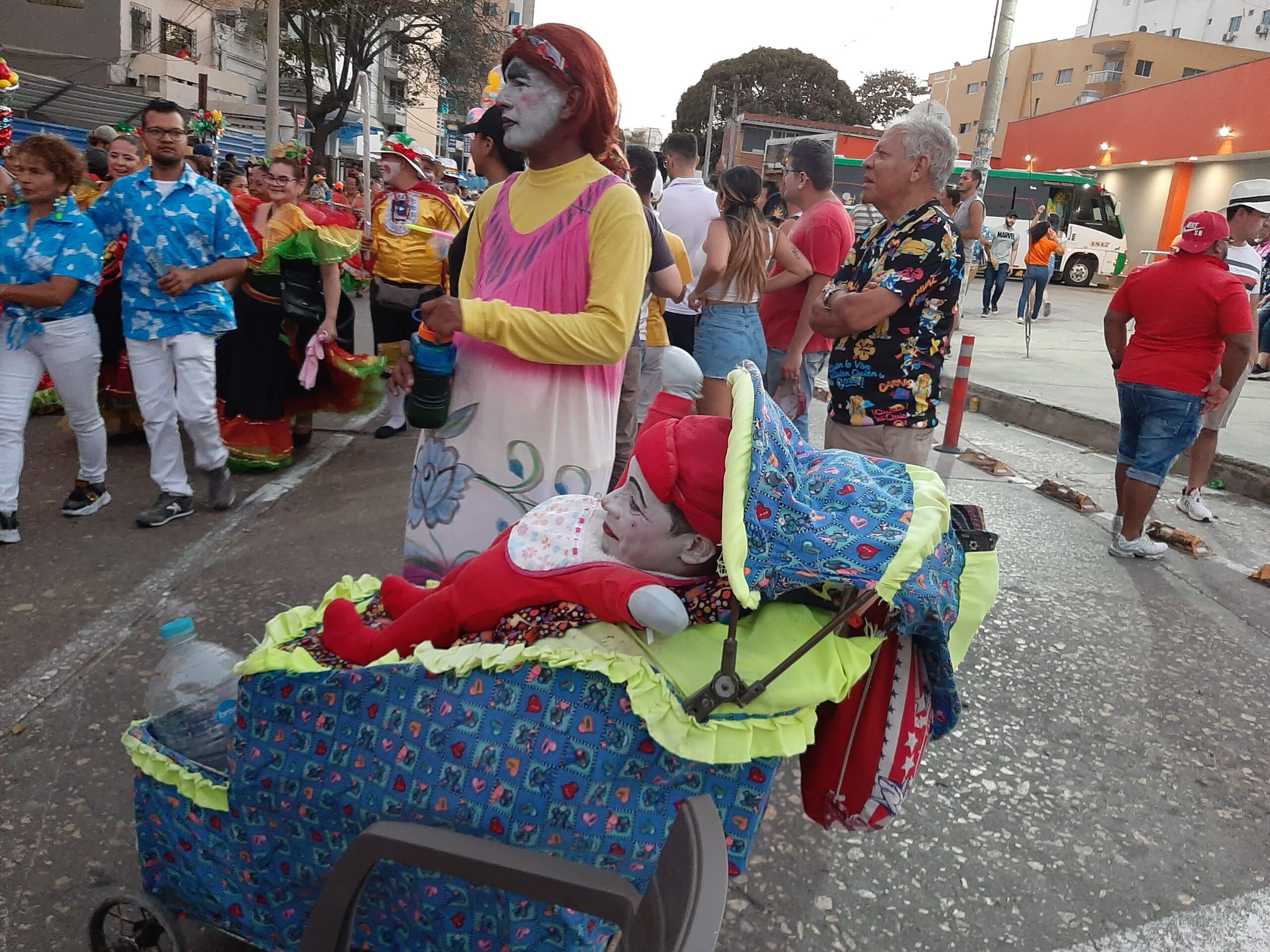 Barranquilla Colombia Carnival with a man dressed as a baby in the stroller